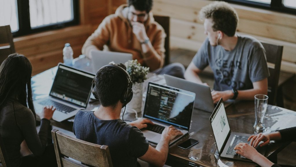 Startup team collaborating during the first 100 days of launch