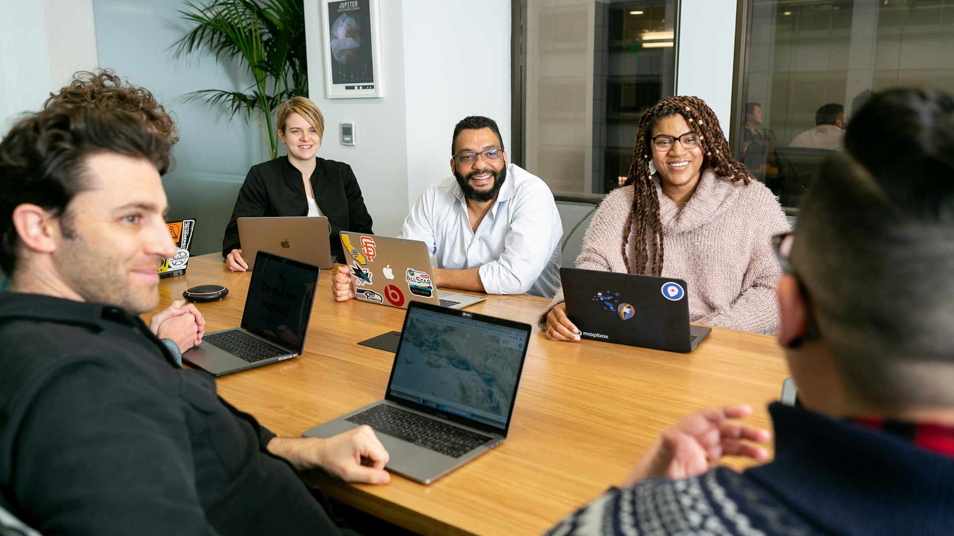 Nonprofit board members working together during a committee meeting